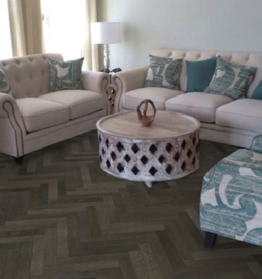 photo of a living space with a parquet floor