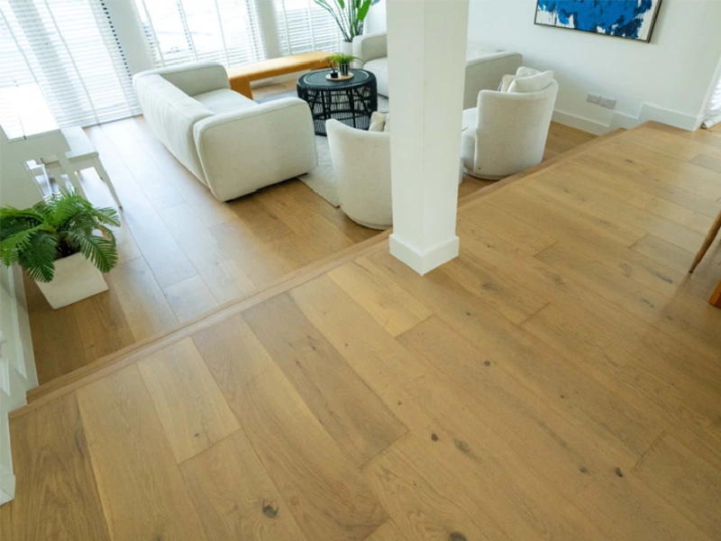 photo of a living space with a wood plank floor